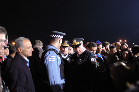 Police helping a woman who fainted